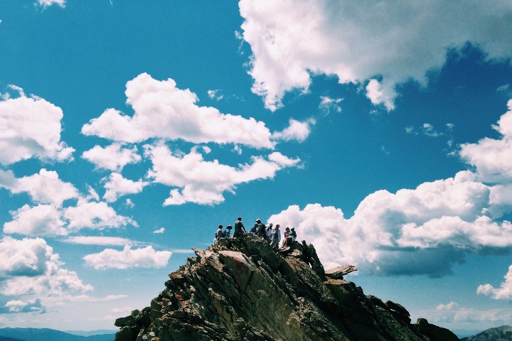 group of people on a mountain top